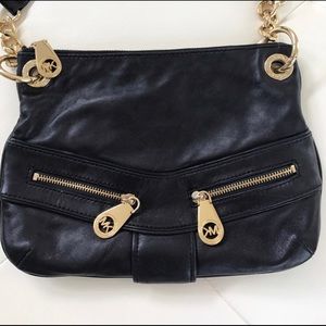 Michael Kors black leather purse with gold accents